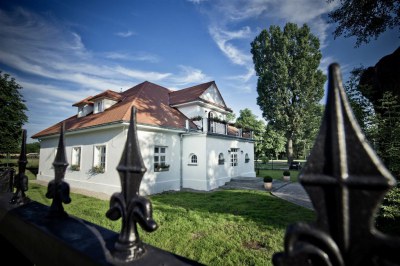 powiększ